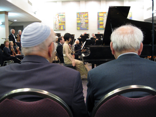 Yukiko Sekino preparing to perform the Rachmaninoff Concerto #2 at Tifereth Israel Community Orchestra concert