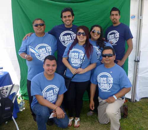 Latinos for Israel, standing, from left, Juan Rico, Jonathan Valverde, Alma Rico, Yssena Rico, David Delgado.  Kneeling: Abel Abeldarama, Henry Aspeytia