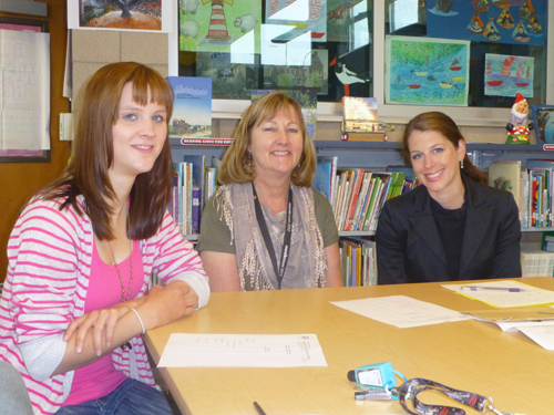 German language teacher Rose Andres of Cabrillo Elementary School sits between interns from Germany, Silja Griese, left, and Laura Brog