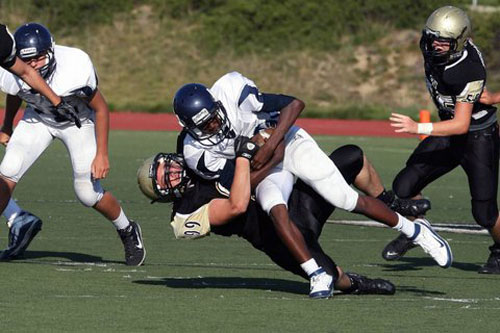 Max Brett makes a tackle (Photo courtesy of Brett family)