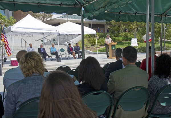 Sheriff's Sergeant Joel Wigand tells of his 9-11 experiences as an honor guard, as, from left, Chemistry Prof. Jeff Lehman, Dr. Irving “Jake” Jacoby, Dean Debbie Yaddow,  Grossmont College President Sunita V. Cooke and ASGC President Esau Cortez listen.   Photo: Stephen Harvey