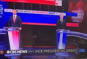 Vice presidential candidates J.D. Vance, left, and Tim Walz faced off Tuesday evening in a debate moderated by CBS reporters Margaret Brennan and Norah O'Donnell. (Screen grab from CBS broadcast)